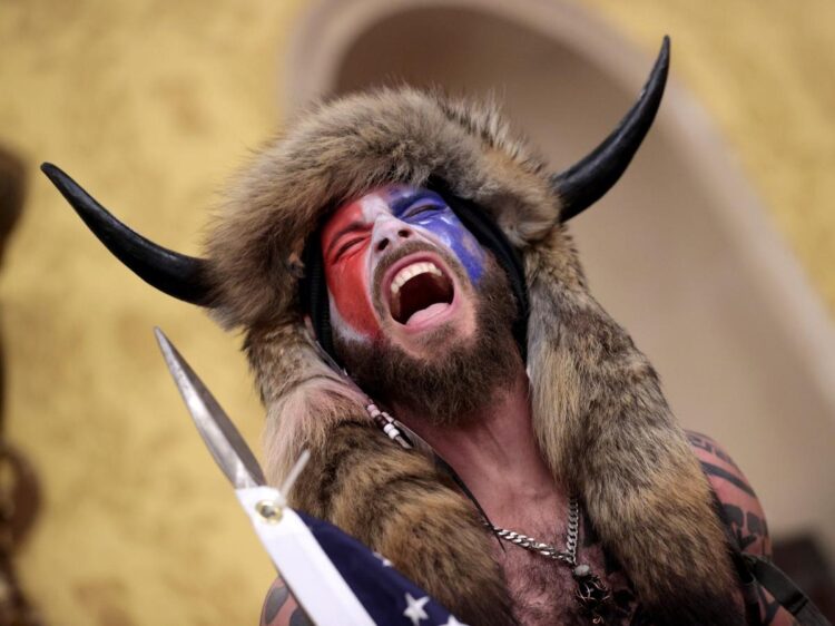 ‘QAnon Shaman’ Jacob Chansley was released early from prison, and a former prosecutor said it’s totally normal to have sentences reduced