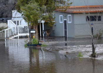 Rising floodwaters lead to more evacuation orders in Arizona