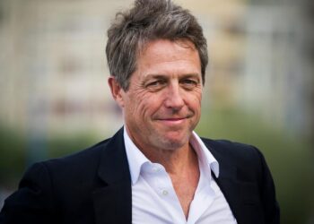 Hugh Grant says movie sets ‘are so weird now’ as actors no longer get drunk and fall ‘in love with each other’ because of mobile phones: ‘It’s so sad’