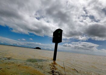California’s ‘phantom lake’ returns with a vengeance, unearthing an ugly history of water