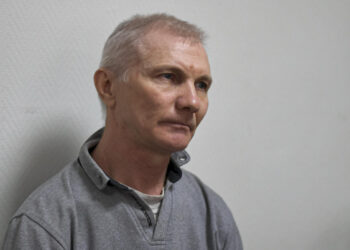 Russia convicts father of teen who drew antiwar pictures