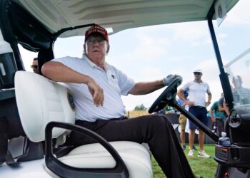 Trump seems disconnected from reality and is still rolling around Mar-a-Lago in a golf cart even as a potential indictment in New York looms: report