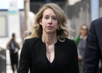 Elizabeth Holmes returns to court in bid to avoid prison