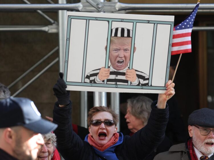 Staring down a possible indictment, Trump holds a rally in Waco. A Texas newspaper said the choice isn’t a dog whistle but an ‘air horn’ to far-right groups.