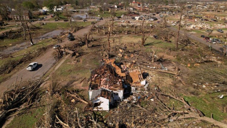 Biden declares emergency as crews dig through storm wreckage