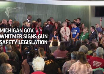 Michigan Gov. Whitmer signs stricter background check, safe gun storage bills