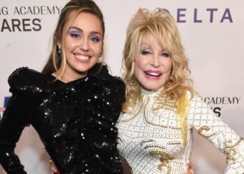 A Wisconsin teacher is on administrative leave after complaining that her school banned Dolly Parton’s ‘Rainbowland’ from a student performance