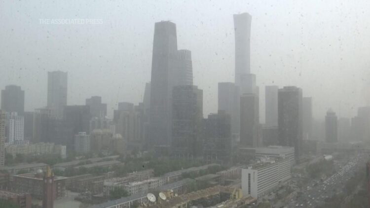 Beijing blanketed with floating sand and dust