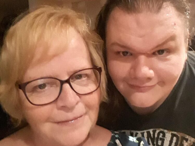 A mom took out over $77,000 in student loans to send her son with autism to college. He got his debt wiped out — but she’s still paying hers off with no end in sight.