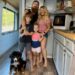A family of 4 living in a solar-powered Greyhound bus share what a typical day looks like on the road