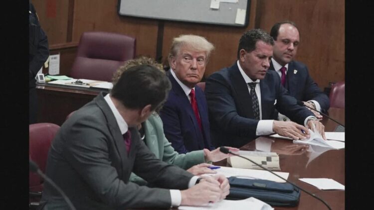 Trump defiant in New York court after historic arrest