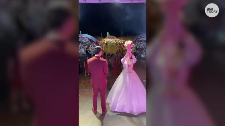 A bride in Thailand caught her own bouquet after the flowers hit the roof and bounced back