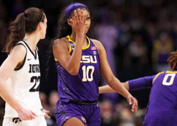 LSU coach reacts to social media attacks on Angel Reese after viral hand gesture