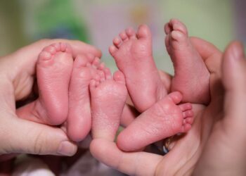A NICU nurse adopted her patient, a 14-year-old teen mom with triplets, to stop them from getting separated in foster care