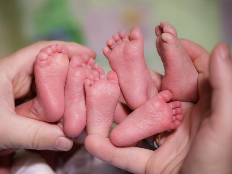 A NICU nurse adopted her patient, a 14-year-old teen mom with triplets, to stop them from getting separated in foster care