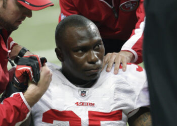 Dad says university failed to treat NFL veteran who shot 6