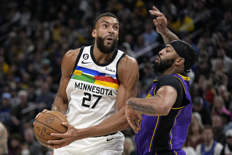 Gobert, Wolves get past punch; big man still has back injury