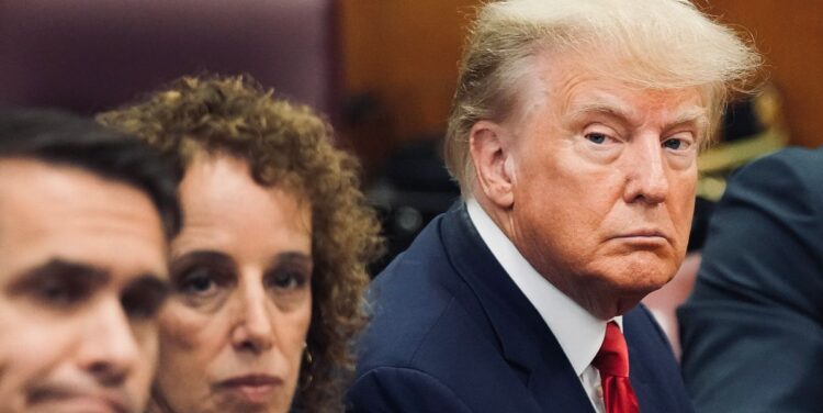 What Trump’s Body Language At His Arraignment Hearing Said