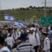 In mass rally, Israeli settlers march to West Bank outpost