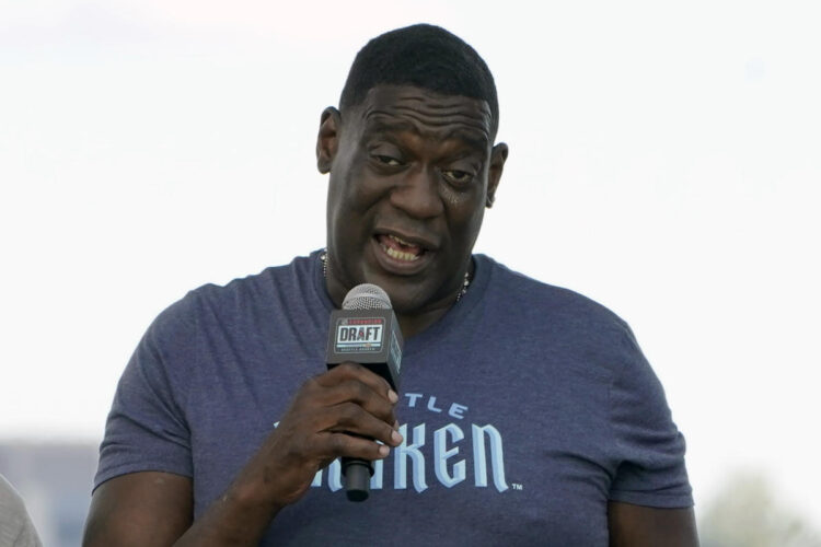 Former NBA star Shawn Kemp charged in parking lot shooting