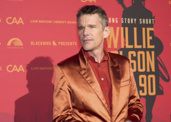 Willie Nelson inhales the love at 90th birthday concert