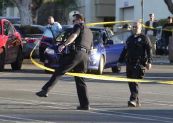 1 dead, 3 wounded in shooting at shopping center