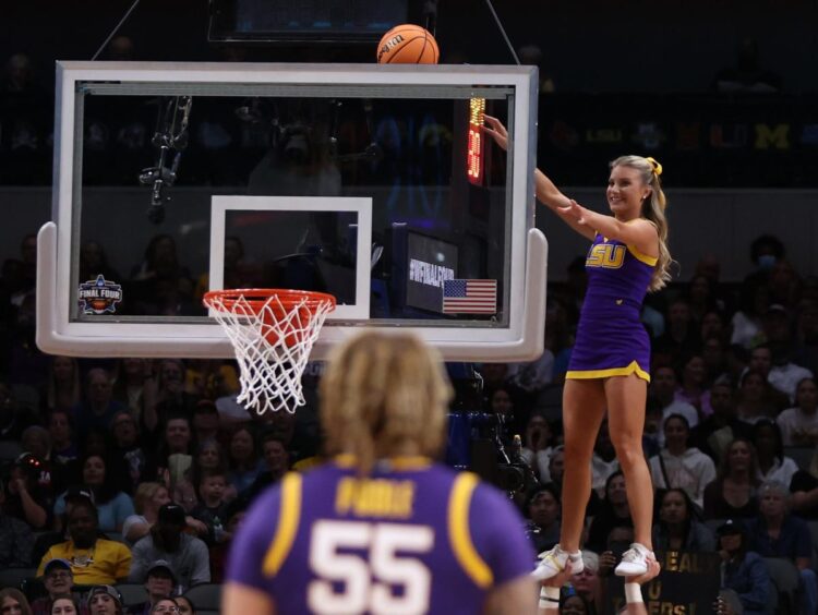 An LSU cheerleader pulled off an impressive stunt to retrieve a basketball stuck above the hoop at the Final Four