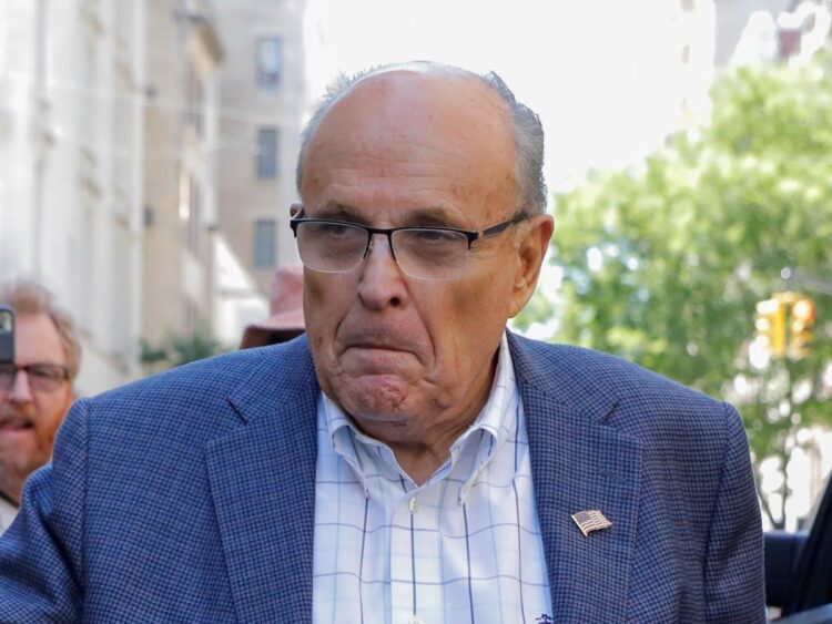 Rudy Giuliani told an employee not to talk to the FBI and then asked for her help googling obstruction of justice, lawsuit says