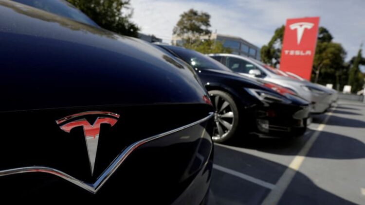 Tesla owners sue, say software updates cut range by 20%, break batteries
