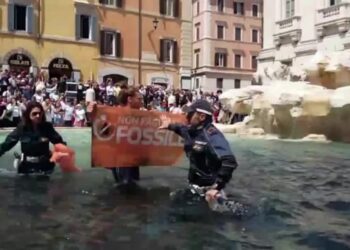 Climate activists turn Rome’s Trevi Fountain black