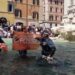 Climate activists turn Rome’s Trevi Fountain black