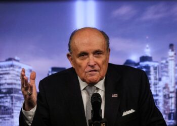 Rudy Giuliani sued for  million by former aide over alleged sexual assault