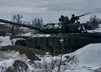 A Russian warlord posed over the body of a US Army vet killed in Ukraine — then bizarrely said he’d send him back to America draped in a flag as a sign of respect