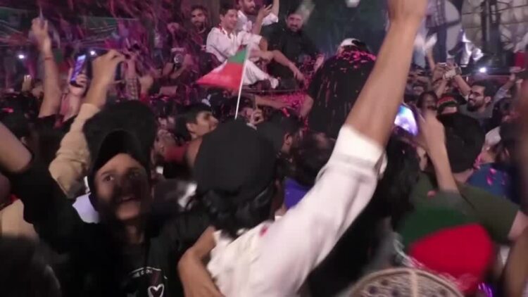 Khan’s supporters welcome him home with rose petals