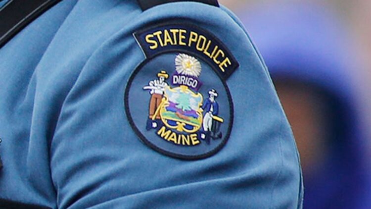 A Maine state trooper shot at a truck approaching the US-Canada border with a sign indicating there was an explosive on board, police say