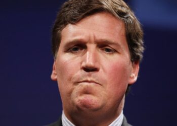 Text shows Tucker Carlson describing how a ‘group of Trump guys’ jumped an ‘Antifa kid,’ saying ‘It’s not how white men fight’