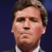 Text shows Tucker Carlson describing how a ‘group of Trump guys’ jumped an ‘Antifa kid,’ saying ‘It’s not how white men fight’