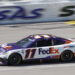 Hamlin bumps Larson for lead on final lap to win at Kansas