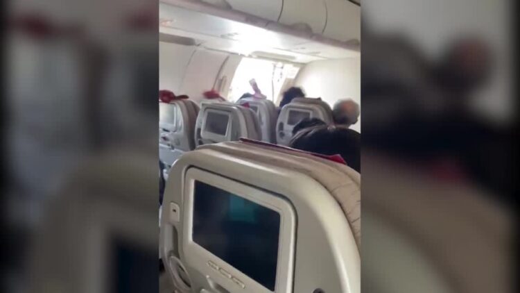 Asiana plane lands safely after door opens mid-flight