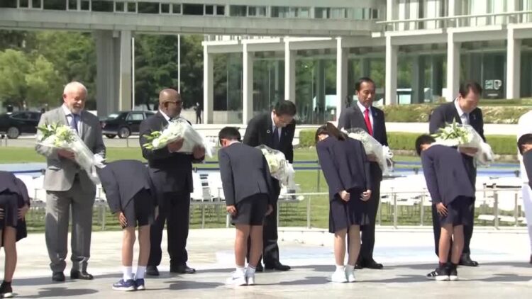 G7 guest leaders lay flowers at Hiroshima Peace Park