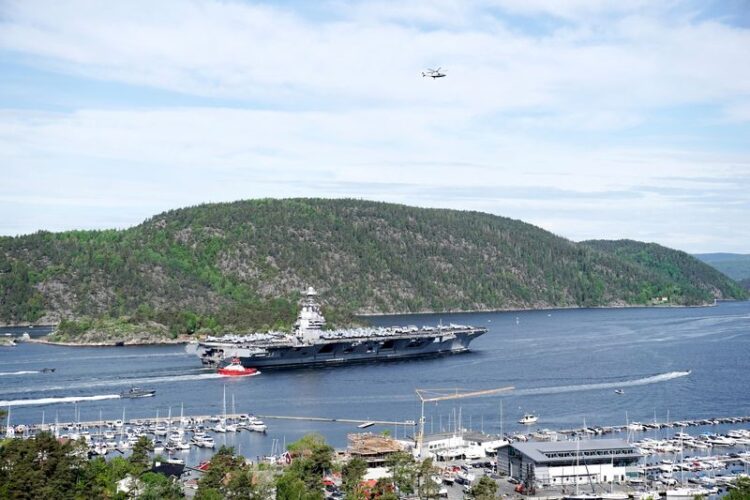 World’s biggest aircraft carrier sails into Oslo for NATO exercises