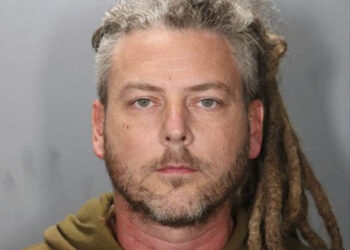 Ex-California cheerleading coach charged with molesting girls