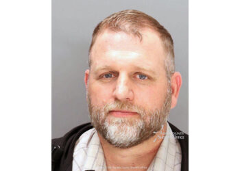 For far-right activist, lawsuit becomes one-sided standoff