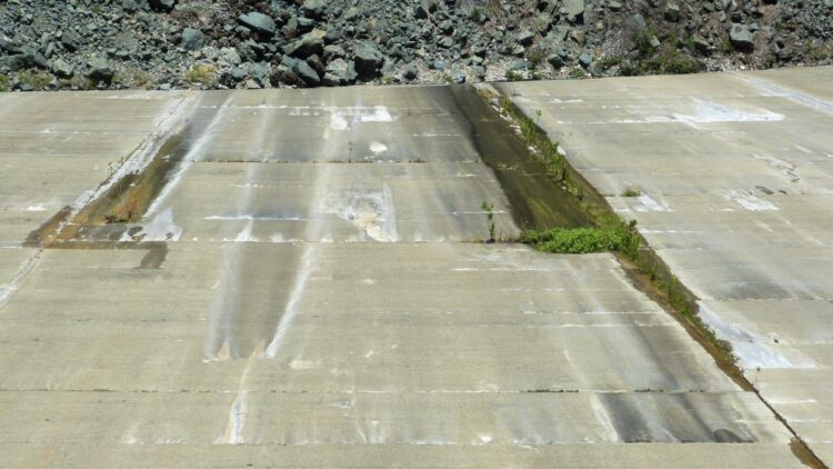 With a fuller Lake Shasta, more water is seeping from the front of Shasta Dam