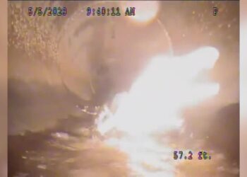 Robot chases alligator through Florida pipe