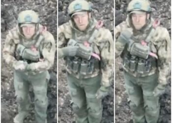 Dramatic video shows a Russian soldier being shot at by his own side as he tries to surrender to a drone, Ukrainian official says