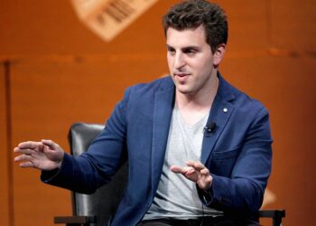Airbnb CEO Brian Chesky, who lets employees work from anywhere, says many CEOs calling workers back to the office are ‘going away to the Hamptons for the summer’