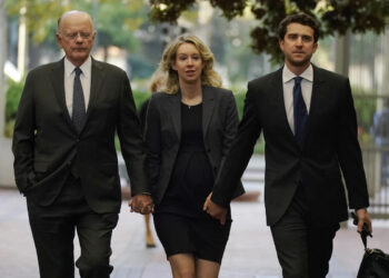 As Elizabeth Holmes heads to prison for fraud, questions remain about her motives