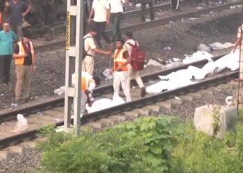 Rescuers pull out bodies hours after India train crash