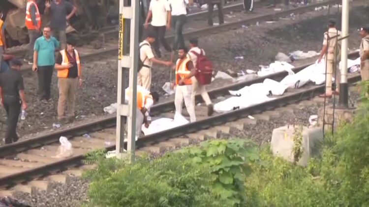 Rescuers pull out bodies hours after India train crash